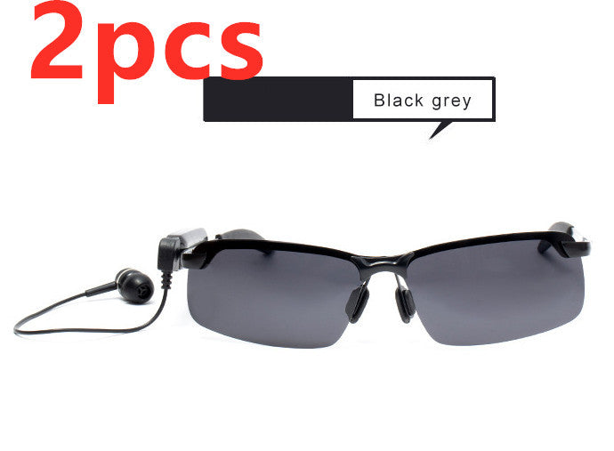 Two pieces of stylish black gray Bluetooth audio sunglasses with integrated speakers for hands-free listening