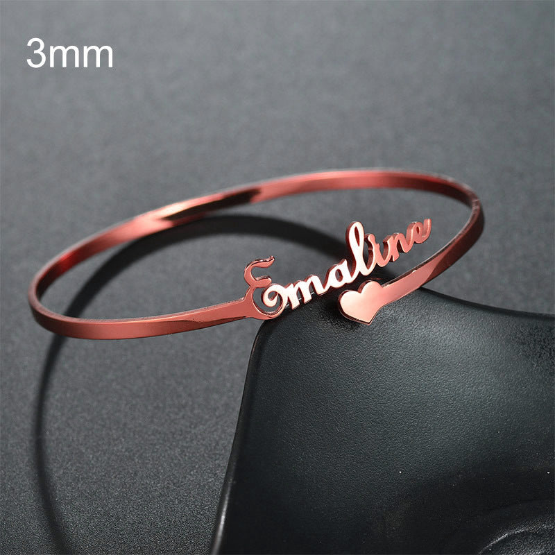 Personalized custom name bracelet in rose gold with a heart design for unique style