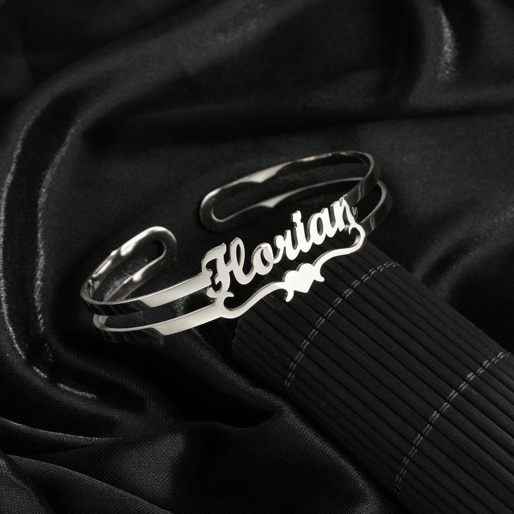 Custom name bracelet in silver with elegant cursive design featuring the name Florian
