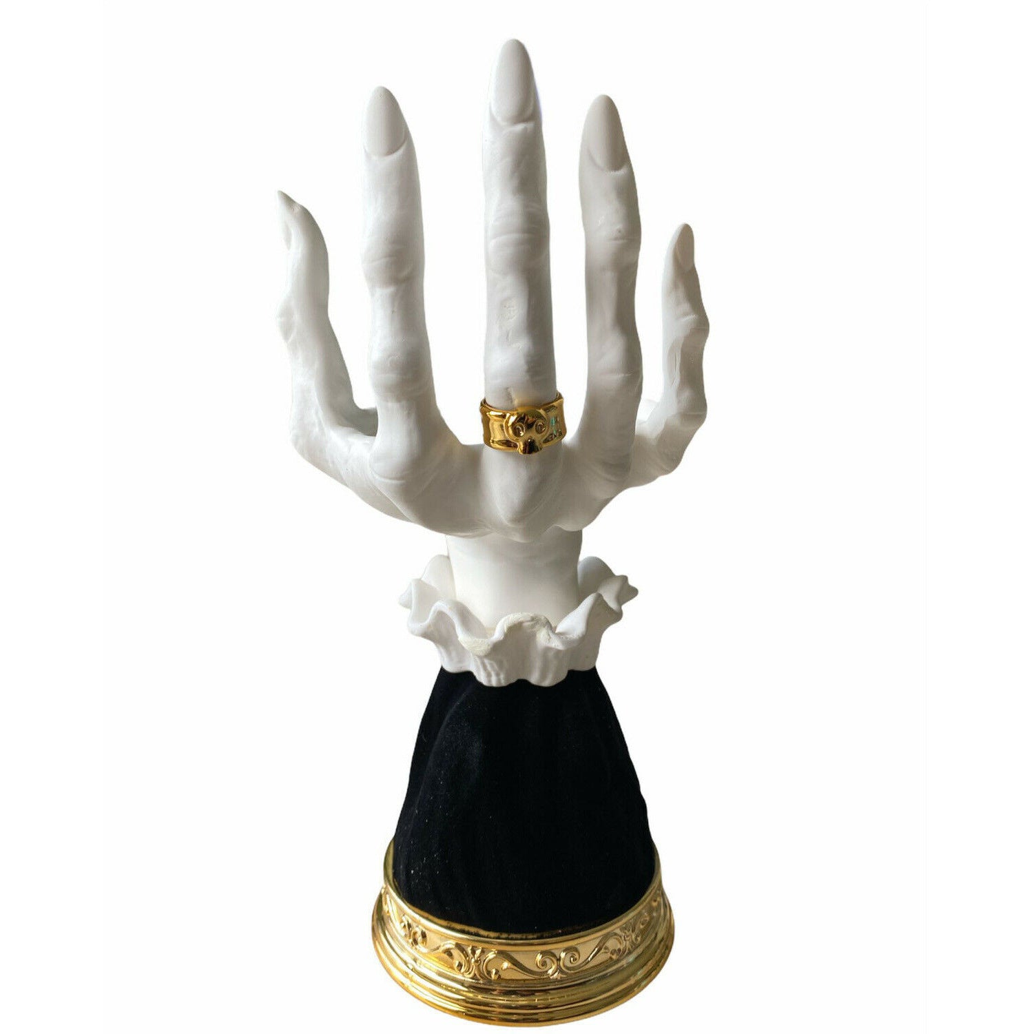 Halloween seat candlestick featuring a decorative spooky hand design with a gold ring