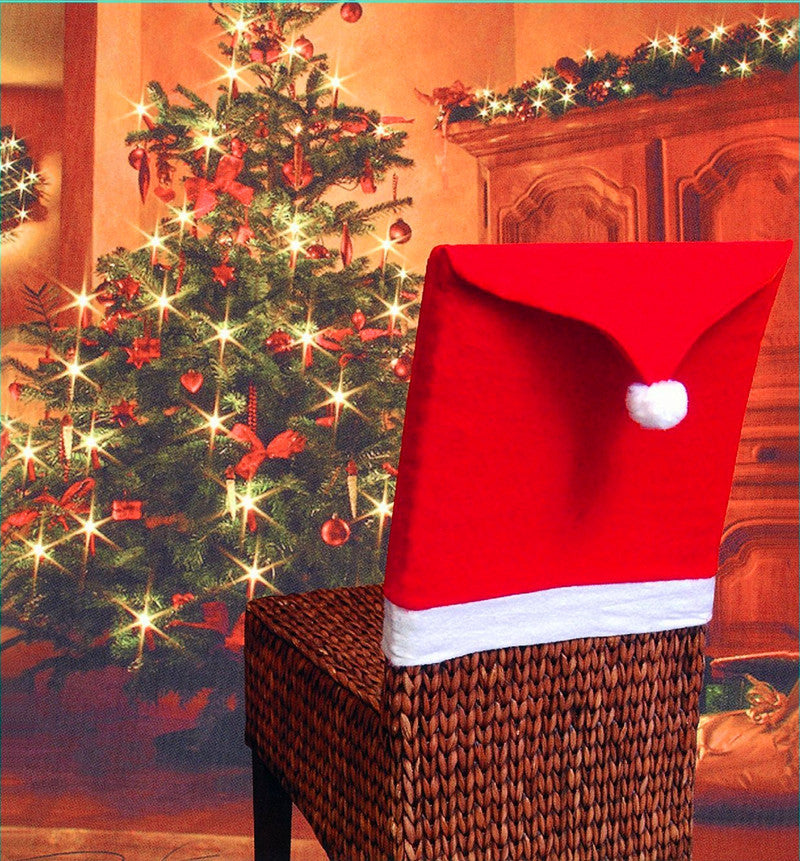 High quality Christmas chair covers in red with a white trim and pom pom, perfect for festive decor