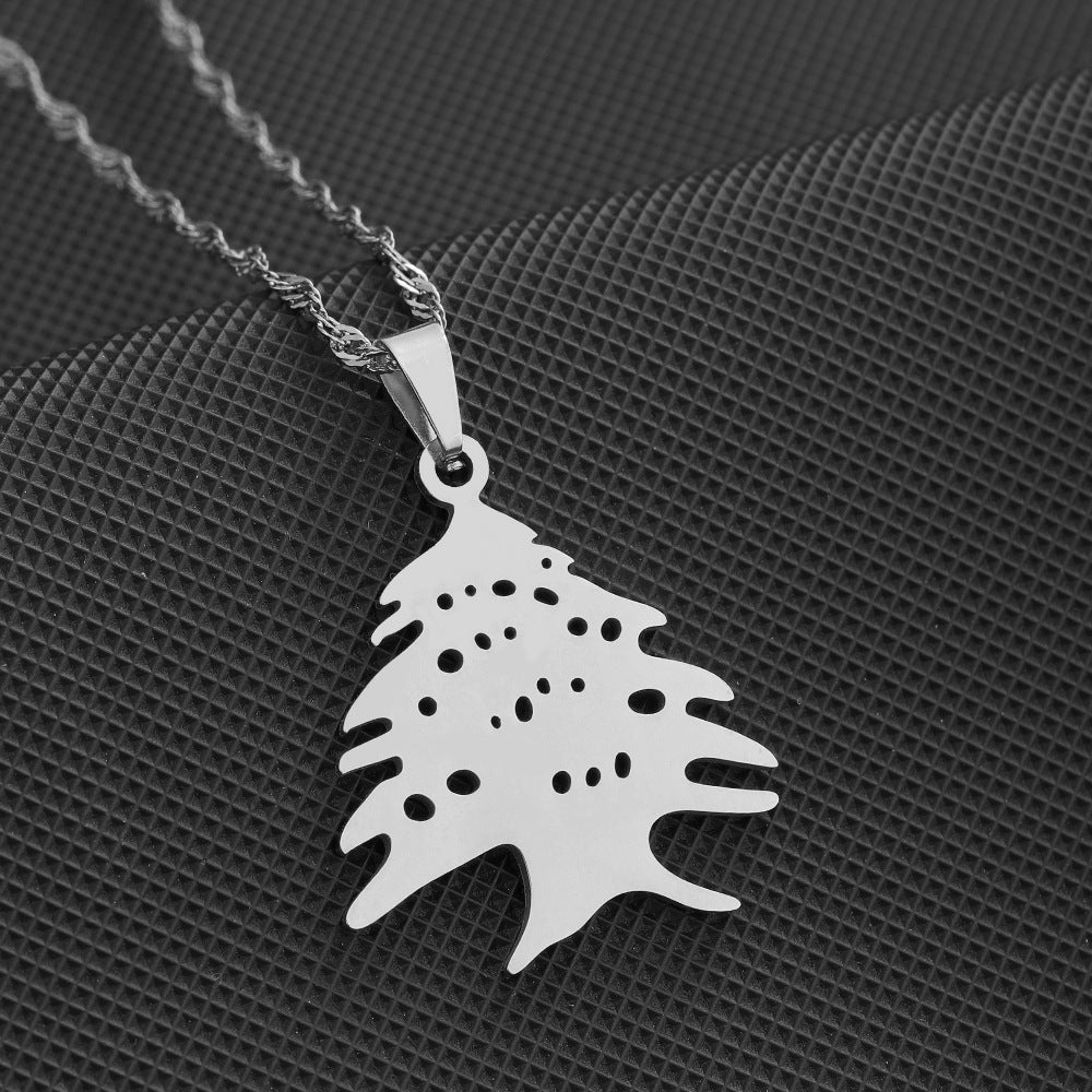 Silver Tree Pendant Necklace from youbuyforme with a unique cutout design on a delicate chain