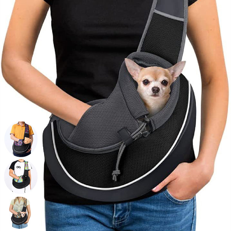 Portable pet carrier bag in black designed for small dogs with adjustable straps and breathable mesh panel