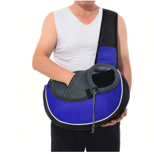 Portable pet carrier bag in blue and black for easy and comfortable pet transportation