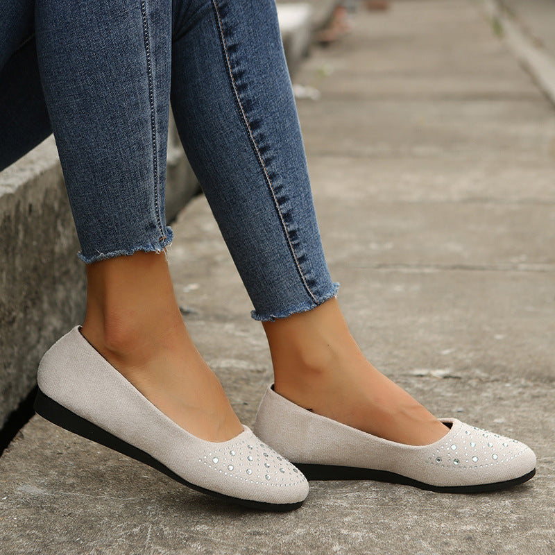 Beige rhinestone flats for women with a comfortable design and stylish embellishments