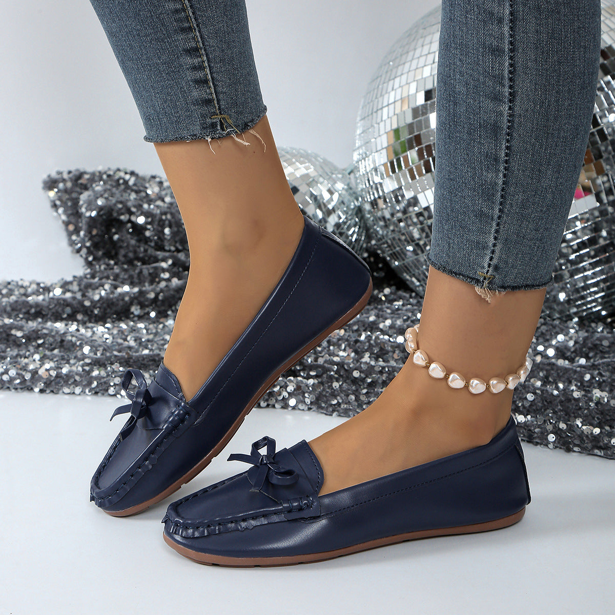 Stylish navy comfortable loafers for women with bow detail, perfect for casual wear